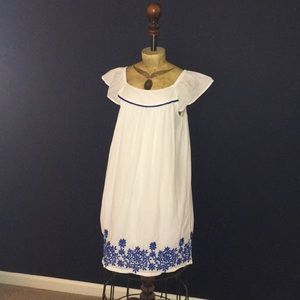 White dress with royal blue embroidery